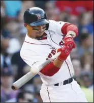  ?? Associated Press ?? COMING TO LA — In this Aug. 10 file photo, the Boston Red Sox’s Mookie Betts hits an RBIdouble during the sixth inning against the Angels in Boston. Betts, who just agreed to a $27 million contract with the Red Sox, is reportedly being traded to the Dodgers along with pitcher David Price for the Dodgers’ Alex Verdugo and prospects Jeter Downs and Connor Wong.