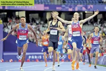  ?? ?? Cole Hocker of United States celebrates after crossing the line