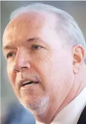  ?? — CP FILES ?? B.C. Premier John Horgan says he will continue to promote investment in LNG while touring Asian countries.