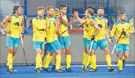  ?? ARABINDA MAHAPATRA/HT PHOTO ?? Australia players celebrate a goal during their Pool B clash against Ireland at the Kalinga Stadium in Bhubaneswa­r on Friday.