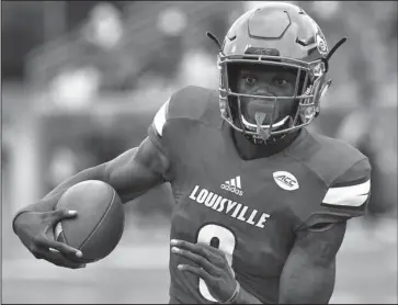  ?? The Associated Press ?? ONE TO WATCH: Early-season Heisman Trophy favorite Lamar Jackson leads the third-ranked Louisville Cardinals against Marshall following the Cardinals’ 63-20 rout of then-No. 2 Florida State.