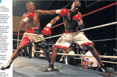  ?? Picture: MICHAEL PINYANA ?? EAT THIS: Mzolisi Yoyo, left, and Luyanda Jako are all action during their bout on Sunday
