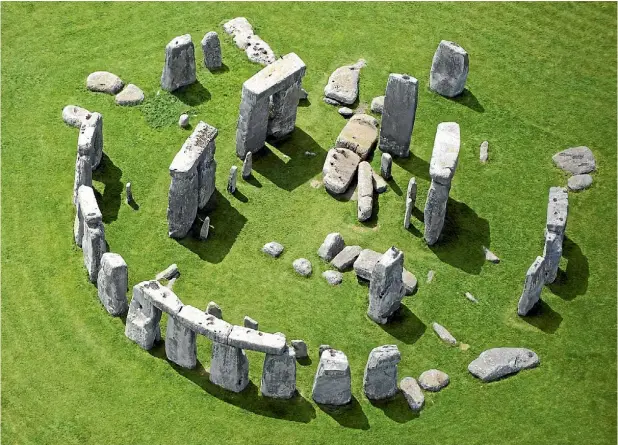  ??  ?? Some say Merlin brought the stones from Ireland to build the magic stone circle of Stonehenge.