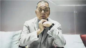  ??  ?? 0 Millionair­e media tycoon Jimmy Lai has been sentenced to 12 months in jail