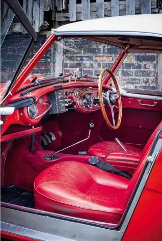  ??  ?? Left and below Mk1’s delightful­ly vivid interior is gloriously undisrupte­d by rally additions, bar harnesses and tripmeter; bigger SUs for rally 3000s.