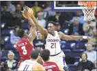  ?? Stephen Dunn / Associated Press ?? UConn’s Mamadou Diarra blocks a shot by Temple’s Shizz Alston Jr. on Feb. 28, 2018.