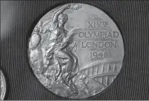  ?? AFP ?? Charles Coste's Olympic gold medal from the 1948 London Olympic Games.