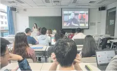  ??  ?? Students watch Feng Wuzhong’s online lecture during a course on Maoist ideology at Tsinghua University in Beijing.