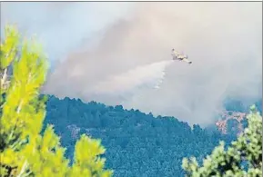  ?? KOKE SERRA / AFP ?? La mitad de las hectáreas quemadas en Yeste son de un parque natural