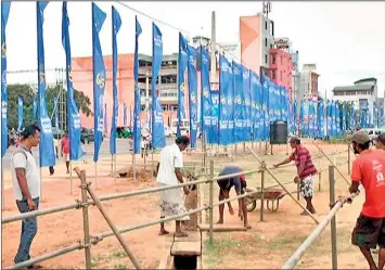  ??  ?? The stage for today’s convention, with flags and railings