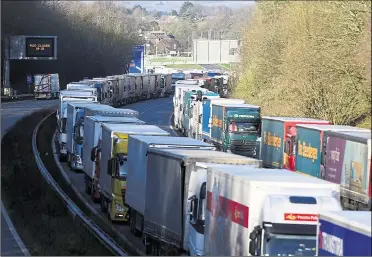  ?? Picture: Barry Goodwin ?? Lorries queuing on the M20 near Junction 10a on Christmas Day