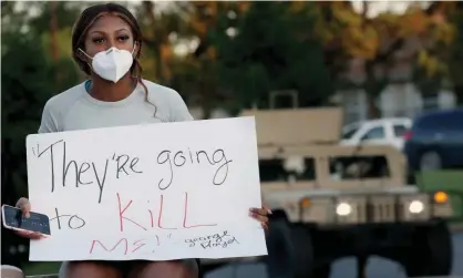  ??  ?? Kennedy Mitchum protests outside the Florissant police department in Missouri on 7 June. Photograph: Christian Gooden/AP