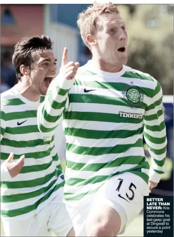  ??  ?? BETTER LATE THAN NEVER: Kris Commons celebrates his last-gasp goal at Dingwall to secure a point yesterday