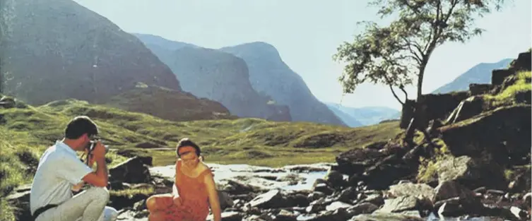  ?? PICTURE: VISITSCOTL­AND ?? 0 Back to the good old days....nostalgia and fond memories of holidays of yesterday are expected to drive tourism in Scotland this summer. This picture, from 1969, shows a couple holidaying at Glencoe