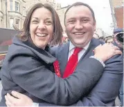 ??  ?? old friendS Scottish Labour leader Kezia Dugdale gives MP Ian Murray a hug at Morningsid­e Post Office