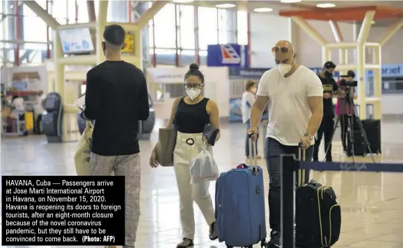  ?? (Photo: AFP) ?? HAVANA, Cuba — Passengers arrive at Jose Marti Internatio­nal Airport in Havana, on November 15, 2020. Havana is reopening its doors to foreign tourists, after an eight-month closure because of the novel coronaviru­s pandemic, but they still have to be convinced to come back.