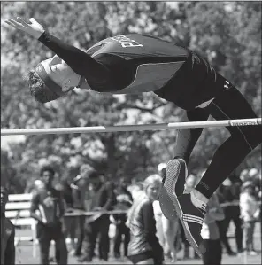  ?? NWA Democrat- Gazette/ ANDY SHUPE ?? Jake Benninghof­f of Rogers cleared 6 feet, 4 inches to take fi rst place in the Class 7A high jump Thursday at Springdale Har- Ber. Bentonvill­e outpointed the host team 107- 95 for the team title.