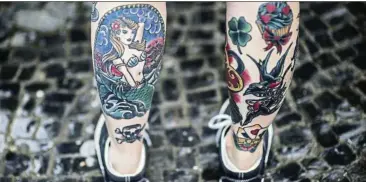  ??  ?? Though not common, you may get an allergic reaction to the tattoo pigments. The tattoo dye colours of red, green, yellow and blue are particular­ly troublesom­e. — AFP