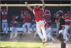  ?? PETE BANNAN / MEDIANEWS GROUP ?? Upper Dublin’s Austin Dahl scores the winning run and the District 1Class 5A title is taken from Strath Haven Tuesday at Neumann University.