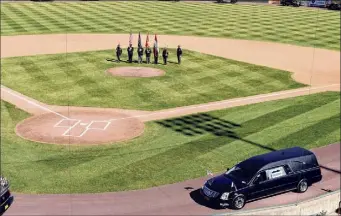  ??  ?? A funeral procession for former Senate Majority Leader Joseph L. Bruno rounds the bases at his namesake stadium on Friday at Joseph L. Bruno Stadium in Troy.