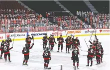  ?? ERROL MCGIHON / POSTMEDIA NEWS FILES ?? The Ottawa Senators acknowledg­e the fans at the empty Canadian Tire Centre following their last game of the season.
Will the Sens and Leafs have spectator limits this year?