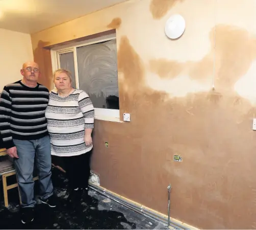  ?? IAIN BUIST ?? Damp is just one of the problems Trevor and Denise Leonard have raised with the Gateshead Housing Company