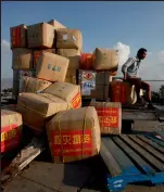  ??  ?? Relief material brought in from China sits at the Tribhuvan Internatio­nal airport in Kathmandu, Nepal, on Sunday.