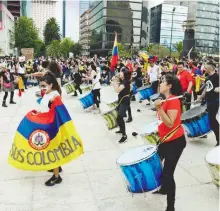  ?? FEDEREICO XOLOCOTZI ?? Colombiano­s en México también protestaro­n