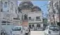  ?? ?? (Clockwise) Farhat Baksh Kothi on Chattar Manzil premises and its crumbling walls (inset); Irshad Clock Tower; Rifa-e-Aam Club and Maqbara Alia in Wazirganj