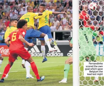  ??  ?? Fernandinh­o scored the own goal which gave Belgium the lead last night