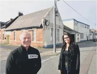  ??  ?? Kevin Washbourne and wife Cheryl outside the club.