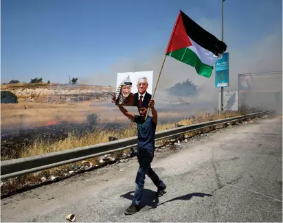  ?? (Reuters) ?? A PALESTINIA­N PROTESTS the Bahrain summit.