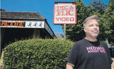  ?? DARREN STONE, TIMES COLONIST ?? Pic-A-Flic owner Kent Bendall at the store’s current Cook Street location. The store is relocating in October to Stadacona Centre on Pandora Avenue.