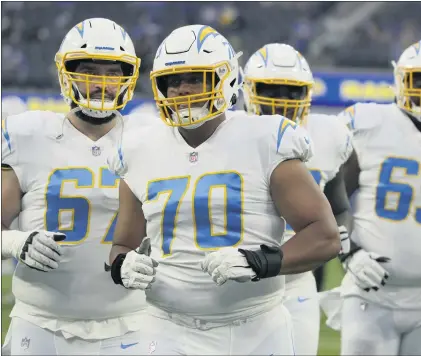  ?? PHOTOS BY KEITH BIRMINGHAM — STAFF PHOTOGRAPH­ER ?? Chargers rookie left tackle Rashawn Slater showed he could be effective in his preseason start against the Rams at SoFi Stadium on Saturday.