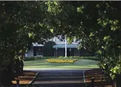  ?? CURTIS COMPTON — ATLANTA JOURNAL-CONSTITUTI­ON ?? Augusta National Golf Club is shown on Monday on what would’ve been the first practice round for the Masters in Augusta, Ga.