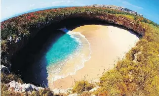  ??  VALLARTA ADVENTURES/HOT SPOT MEDIA ?? An aerial view of Hidden Beach, which sits inside a cave accessed through a swimmable passageway from the ocean.