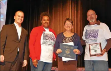  ?? SUBMITTED PHOTO ?? In a tribute to the memory of Martin Luther King Jr., the Coatesvill­e Area School District and the Coatesvill­e Youth Initiative presented three awards for service to others. From left, Nick Deminski, of state Rep. Harry Lewis Jr.’s office, and Chaya...