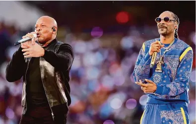  ?? Kevin C. Cox/Getty Images ?? “Rapper’s Deluxe” makes the case that when Dr. Dre, left, and Snoop Dogg performed at the halftime show at Super Bowl LVI, it signified the music’s acceptance and dominance in mainstream American culture.