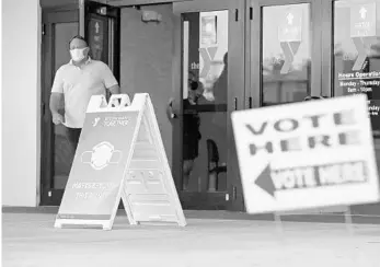  ?? JOHN MCCALL/SOUTH FLORIDA SUN SENTINEL ?? A man leaves the Pembroke Pines YMCA Family Center polling station on primary election day, Aug. 18.