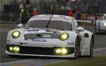  ??  ?? Porsche still go racing with the 911. As a 50th birthday gesture they entered two 911s in this year’s Le Mans 24 Hours. The result was a class 1-2