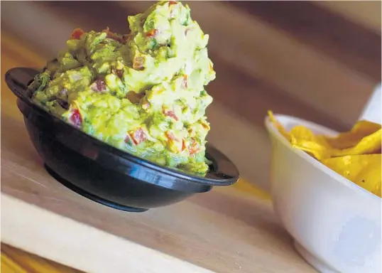  ?? BLACK ROOSTER TAQUERIA ?? Co-owner Juliana Calloway describes Black Rooster Taqueria’s guac as “medium-chunky” and believes its freshness — each serving is made to order — is a big part of its popularity.