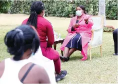  ??  ?? First Lady Auxillia Mnangagwa interacts with sex workers urging them to shun prostituti­on and start income generating projects so as to earn a decent living, at Zimbabwe House on Friday.