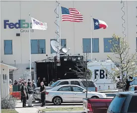  ?? SCOTT OLSON GETTY IMAGES ?? A package exploded shortly after midnight in a FedEx facility in Texas Tuesday morning.