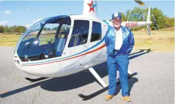  ?? FILE PHOTO ?? Retired Army officer Henry Schwarz was president of the Virginia Helicopter Associatio­n. In this 2015 photograph, he stood in front of the Robinson R44 Raven II he later crashed.