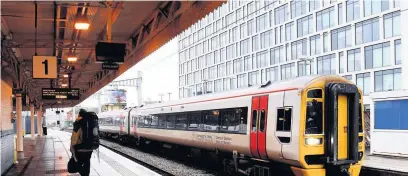  ??  ?? A TFW train at Cardiff Central station