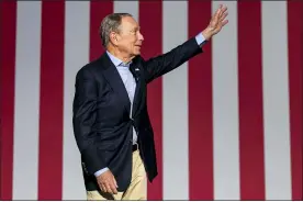  ?? ASSOCIATED PRESS ?? Democratic presidenti­al candidate Mike Bloomberg waves to supporters as he arrives to his campaign rally at the Palm Beach County Convention Center in West Palm Beach.