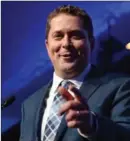  ?? FRANK GUNN, THE CANADIAN PRESS ?? Andrew Scheer won the federal Conservati­ve Party leadership in Toronto on Saturday on the 12th ballot over Maxime Bernier.