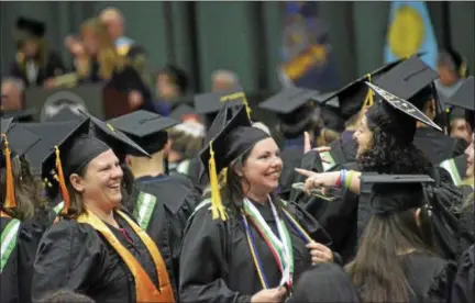  ?? JOSEPH PHELAN -- JPHELAN@DIGITALFIR­STMEDIA.COM ?? Smiles were everywhere Saturday as Hudson Valley Community College held its 64th commenceme­nt.