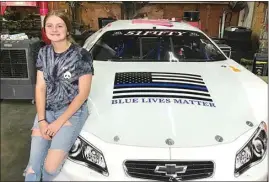  ?? SUBMITTED PHOTO ?? Kercie Jung, a 15-year-old sophomore at Independen­ce High, added a large sticker featuring a Blue Lives Matter flag to the hood of her racer for three races at Madera Speedway to show her support for law enforcemen­t and first responders.