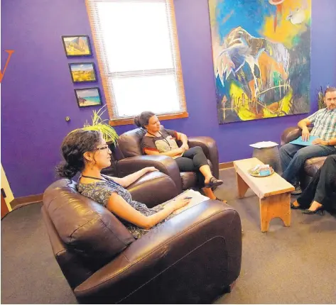  ??  ?? Rebecca Avitia meets with members of her staff. From left to right are Annette Lujan, Jadira Gurule, Alberto Cuessy and Avitia